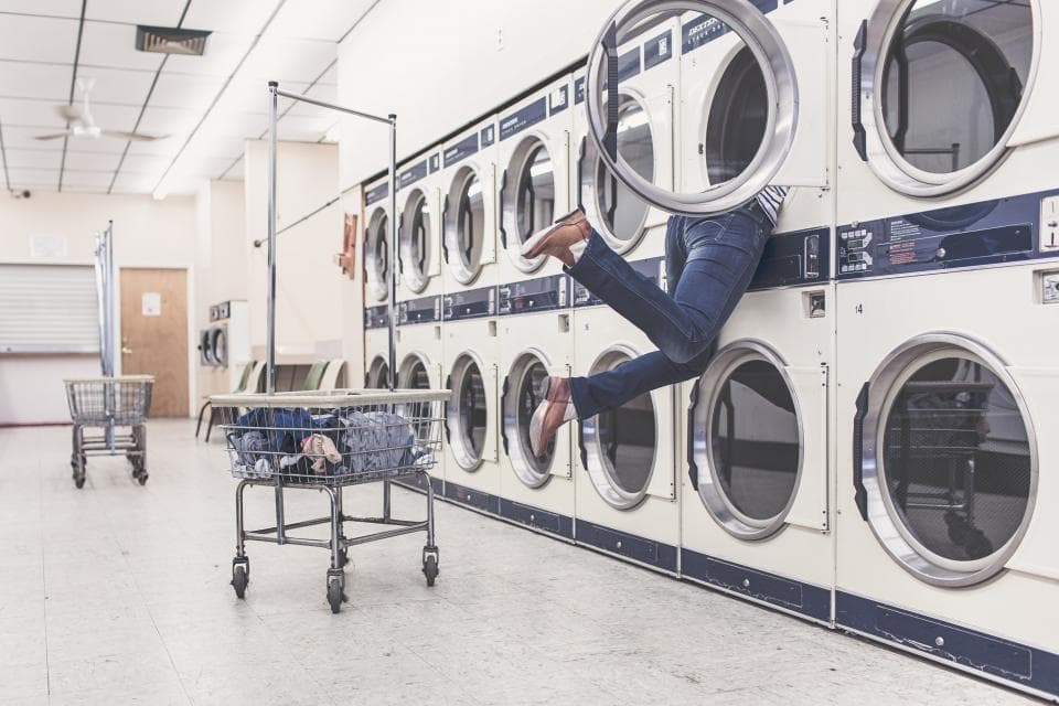 Washing machines inside a working laundromat